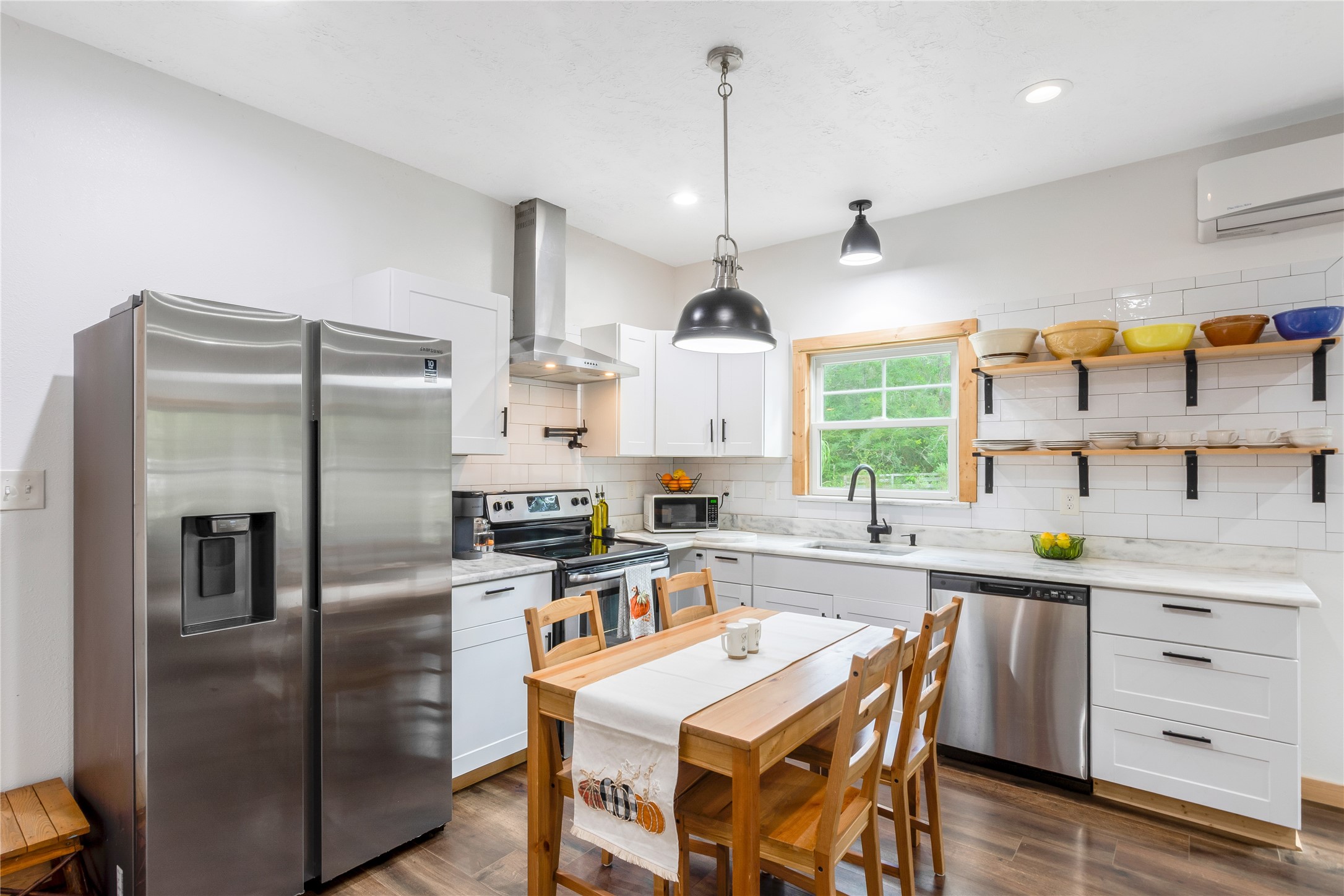 1080 Hill Road Willis, TX 77378 - Photo 11 of 33 a kitchen with granite countertop a sink appliances cabinets and counter space