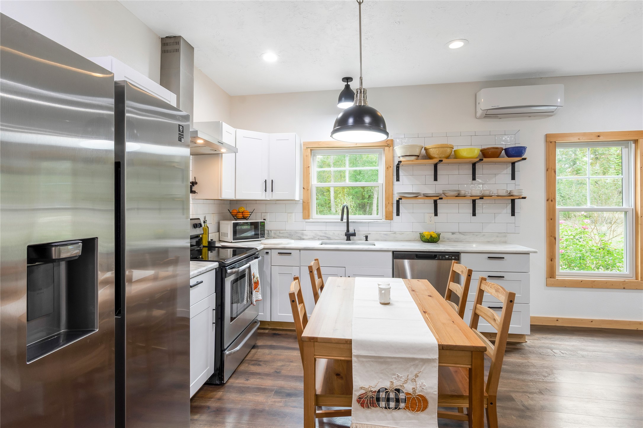 1080 Hill Road Willis, TX 77378 - Photo 13 of 33 a kitchen with stainless steel appliances granite countertop a stove refrigerator sink and cabinets