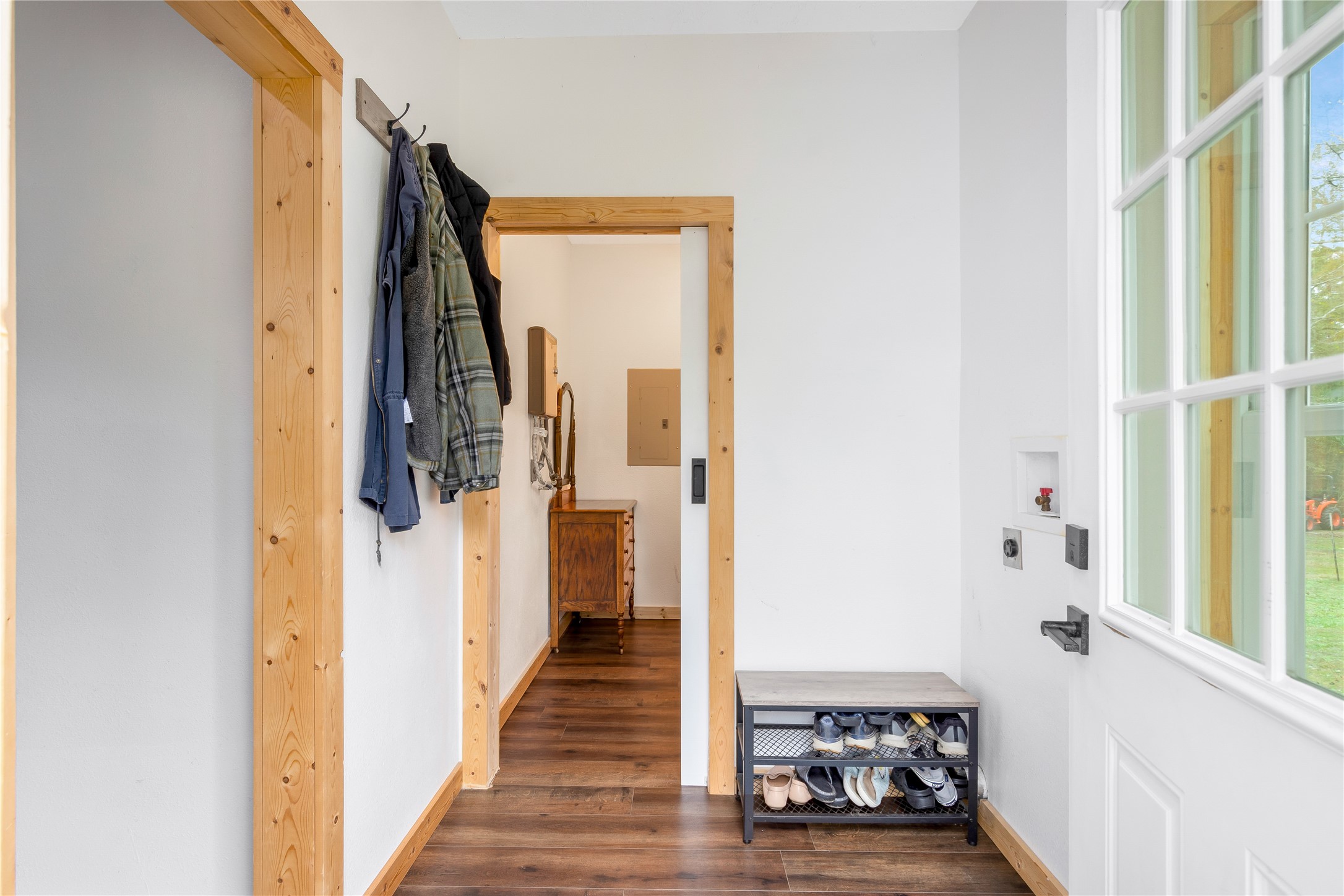 1080 Hill Road Willis, TX 77378 - Photo 22 of 33 a view of a hallway with wooden floor and staircase
