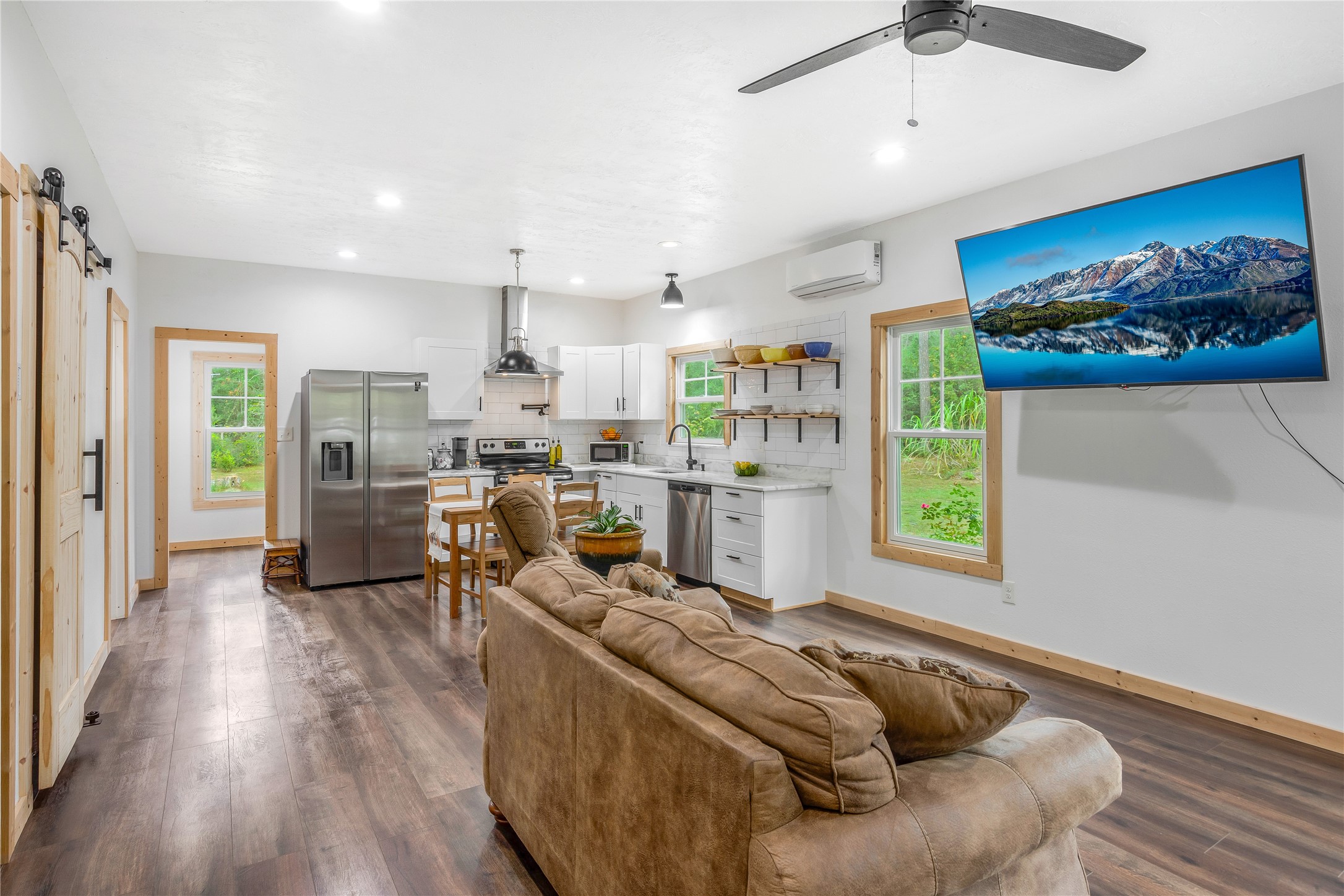 1080 Hill Road Willis, TX 77378 - Photo 7 of 33 a living room with furniture kitchen view and a window