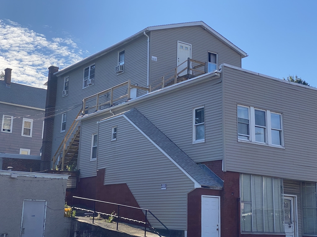 23 Suffolk Street Worcester, MA 01604 - Photo 2 of 18 a top view of a house with a balcony