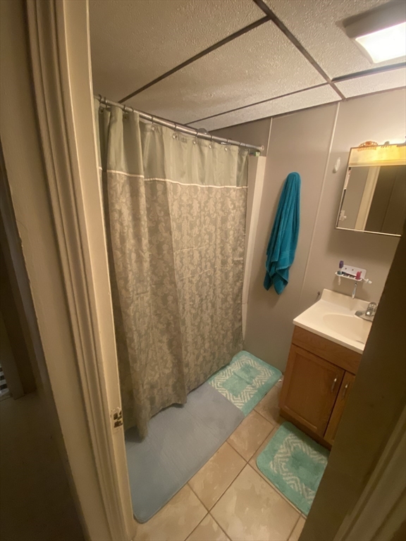 23 Suffolk Street Worcester, MA 01604 - Photo 9 of 18 a bathroom with a shower and a sink