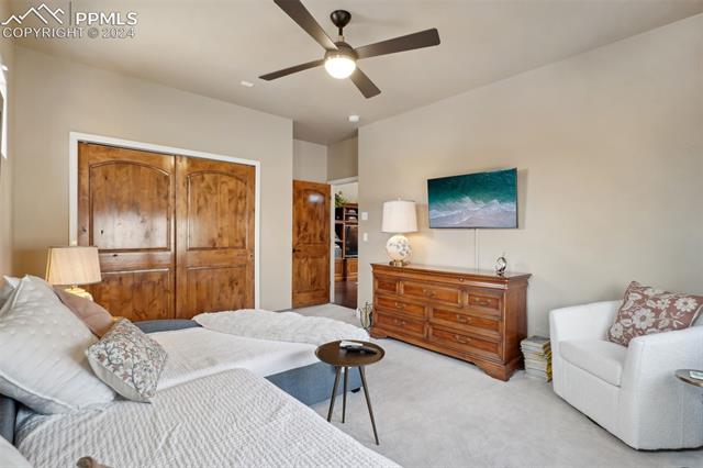2204 Rocking Horse Court Colorado Springs, CO 80921 - Photo 22 of 50 Bedroom featuring light carpet and ceiling fan