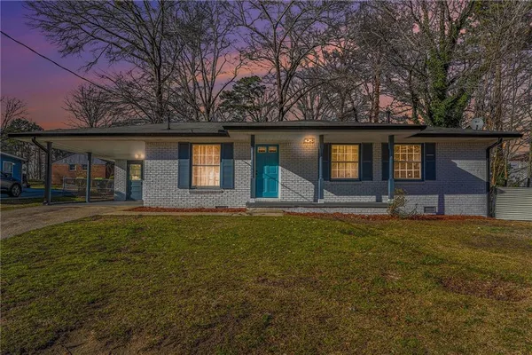 a front view of house with yard
