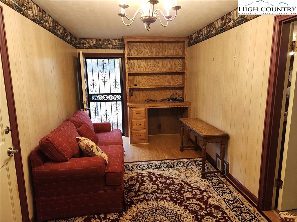 865 Armory Road North Wilkesboro, NC 28659 - Photo 15 of 40 a living room with furniture a rug and a window