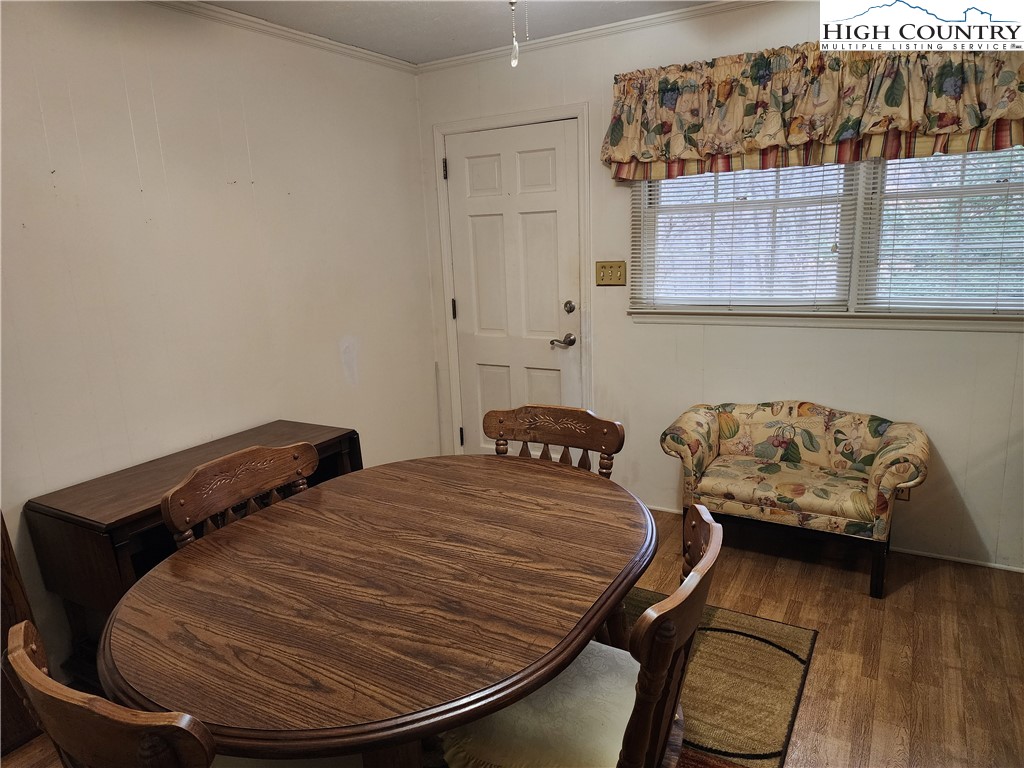 865 Armory Road North Wilkesboro, NC 28659 - Photo 21 of 40 a bedroom with a bed and wooden floor