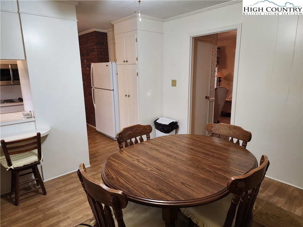 865 Armory Road North Wilkesboro, NC 28659 - Photo 22 of 40 a bedroom with a bed and a table in it