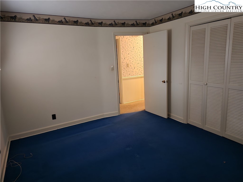 865 Armory Road North Wilkesboro, NC 28659 - Photo 28 of 40 a view of small space with wooden floor and a window