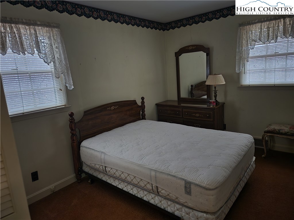865 Armory Road North Wilkesboro, NC 28659 - Photo 31 of 40 a bedroom with bed and window