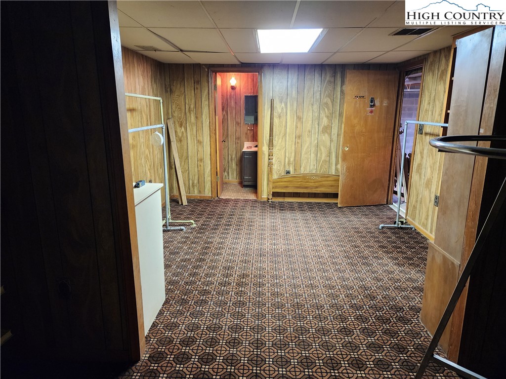 865 Armory Road North Wilkesboro, NC 28659 - Photo 38 of 40 a view of a hallway with wooden walls