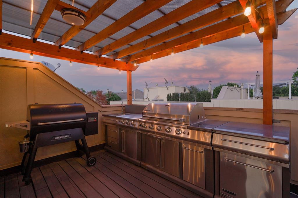 4618 Cedar Springs Road, Unit C Dallas, TX 75219 - Photo 12 of 14 Rooftop Deck with Outdoor Kitchen