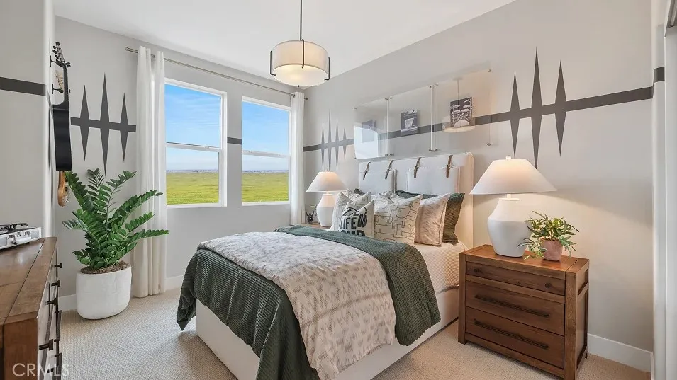 1022 Currant Road Fullerton, CA 92835 - Photo 15 of 25 a bedroom with a bed and a potted plant