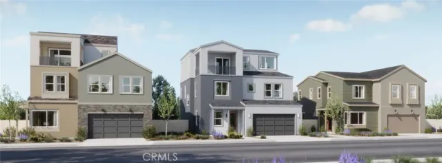 a aerial view of a house next to a yard