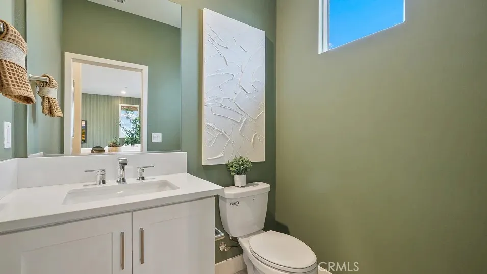 1022 Currant Road Fullerton, CA 92835 - Photo 6 of 25 a bathroom with a sink a toilet and shower