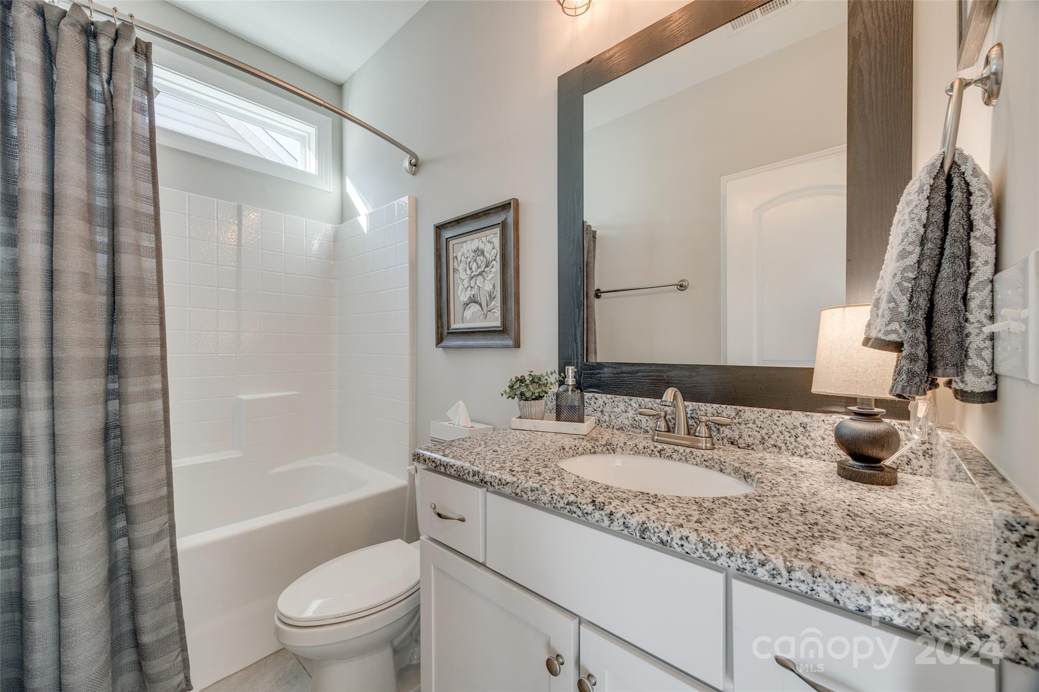 133 Pine Eagle Drive Rock Hill, SC 29732 - Photo 12 of 25 a bathroom with a granite countertop sink toilet and shower