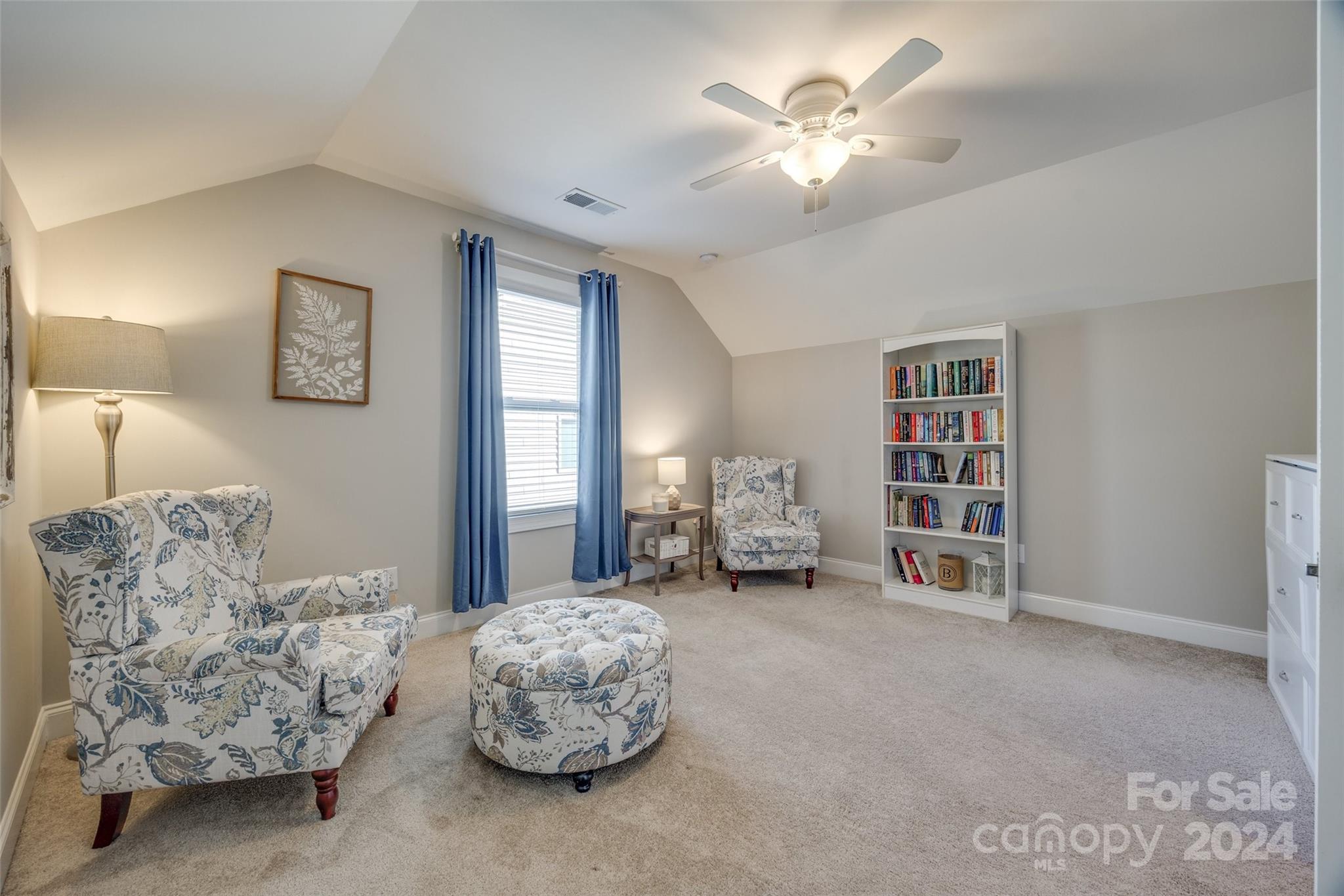 133 Pine Eagle Drive Rock Hill, SC 29732 - Photo 13 of 25 a living room with furniture and a chandelier