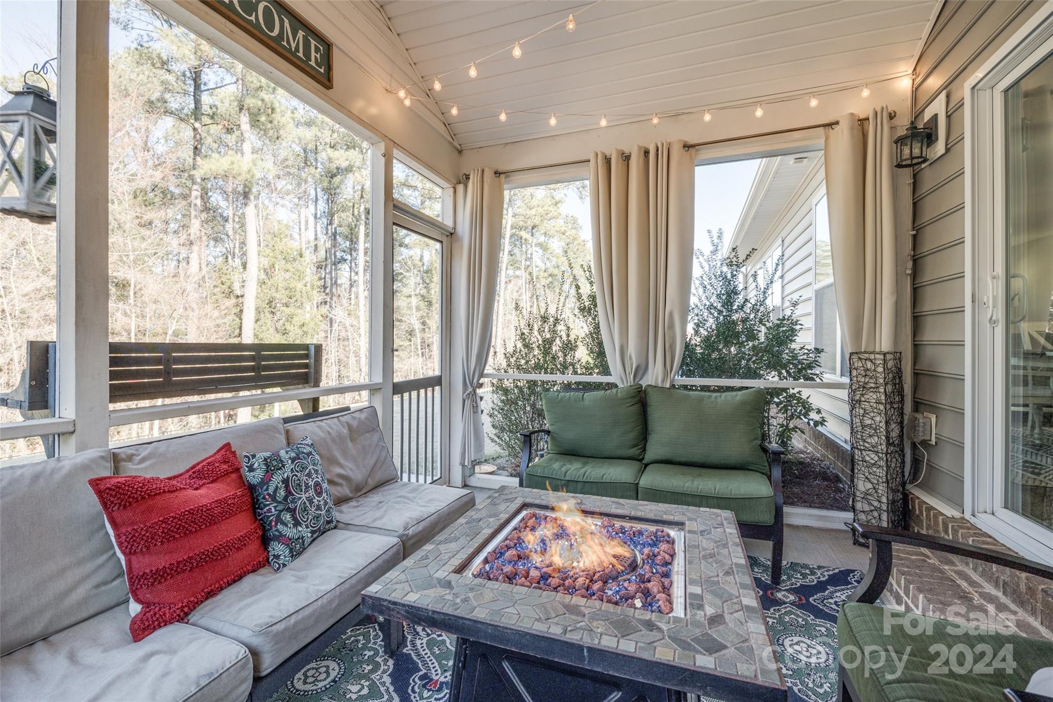 133 Pine Eagle Drive Rock Hill, SC 29732 - Photo 17 of 25 a living room with furniture and a floor to ceiling window