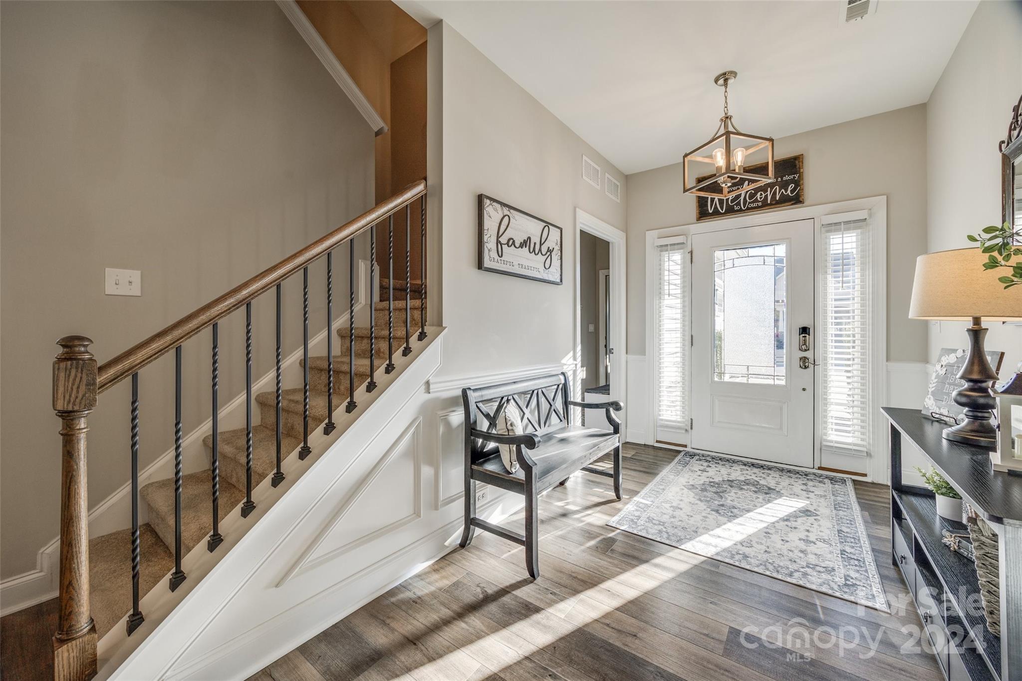 133 Pine Eagle Drive Rock Hill, SC 29732 - Photo 3 of 25 a view of an entryway wooden floor and furniture