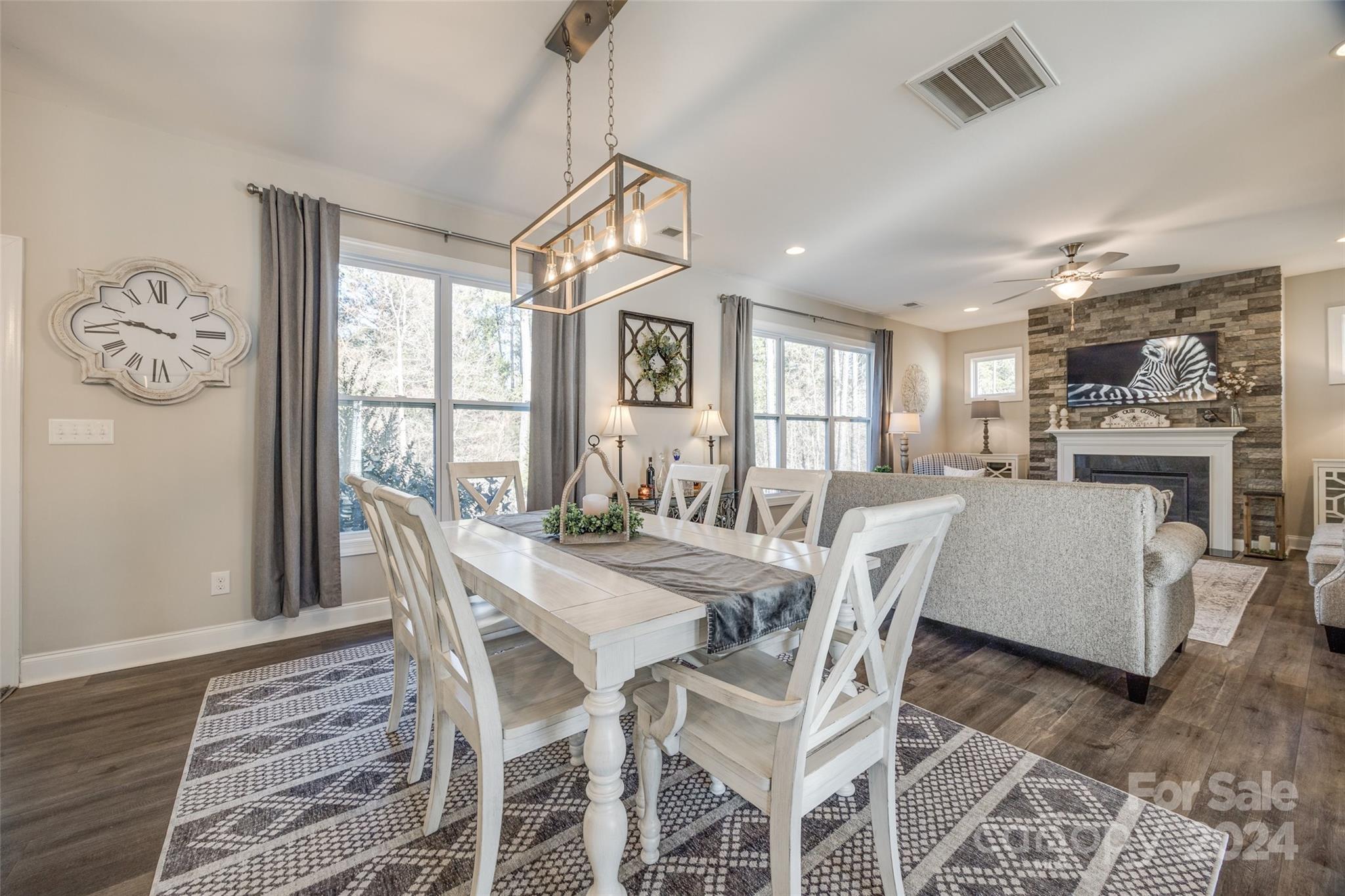 133 Pine Eagle Drive Rock Hill, SC 29732 - Photo 8 of 25 a view of a dining room with furniture window and wooden floor