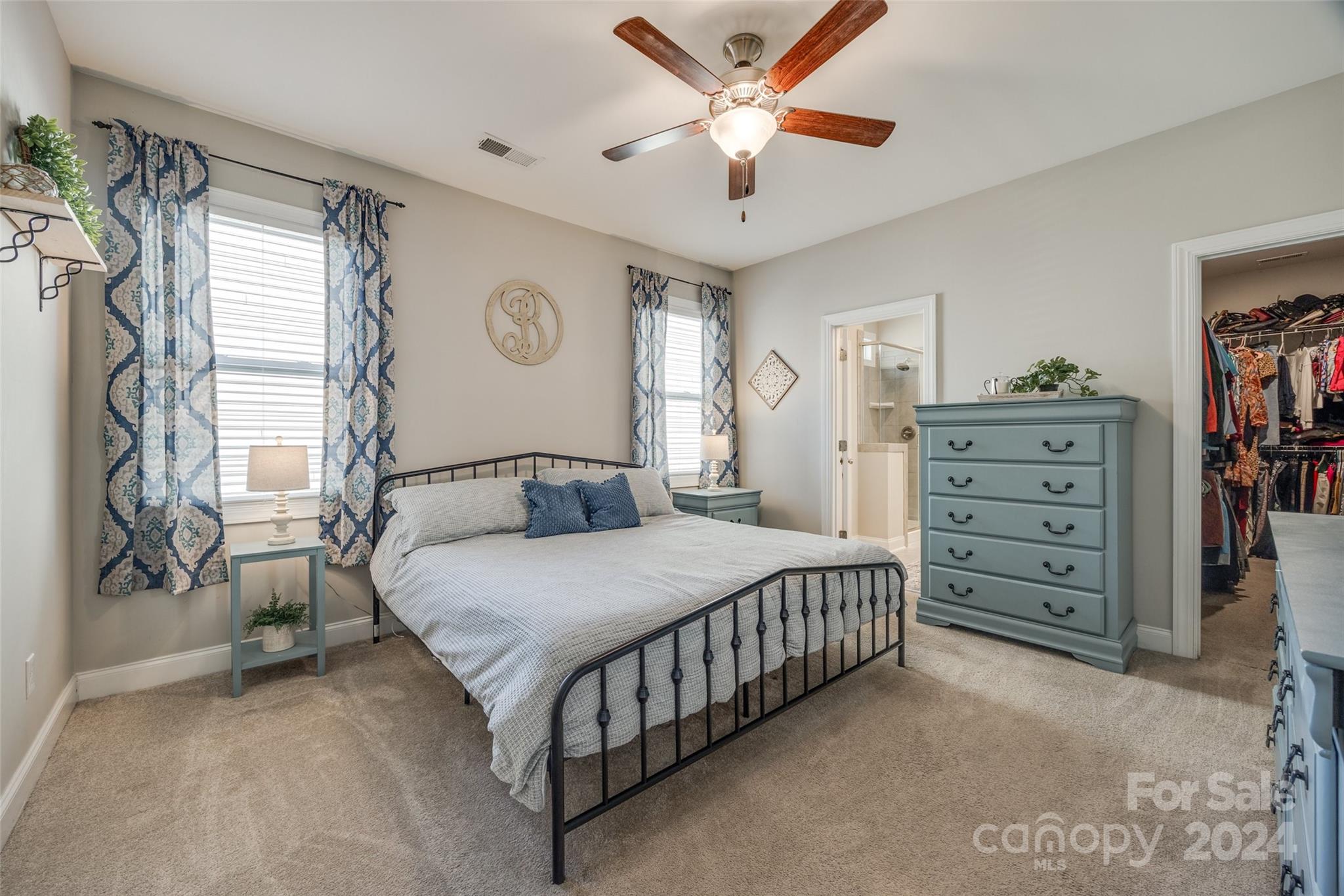 133 Pine Eagle Drive Rock Hill, SC 29732 - Photo 9 of 25 a bedroom with a bed chandelier and a window