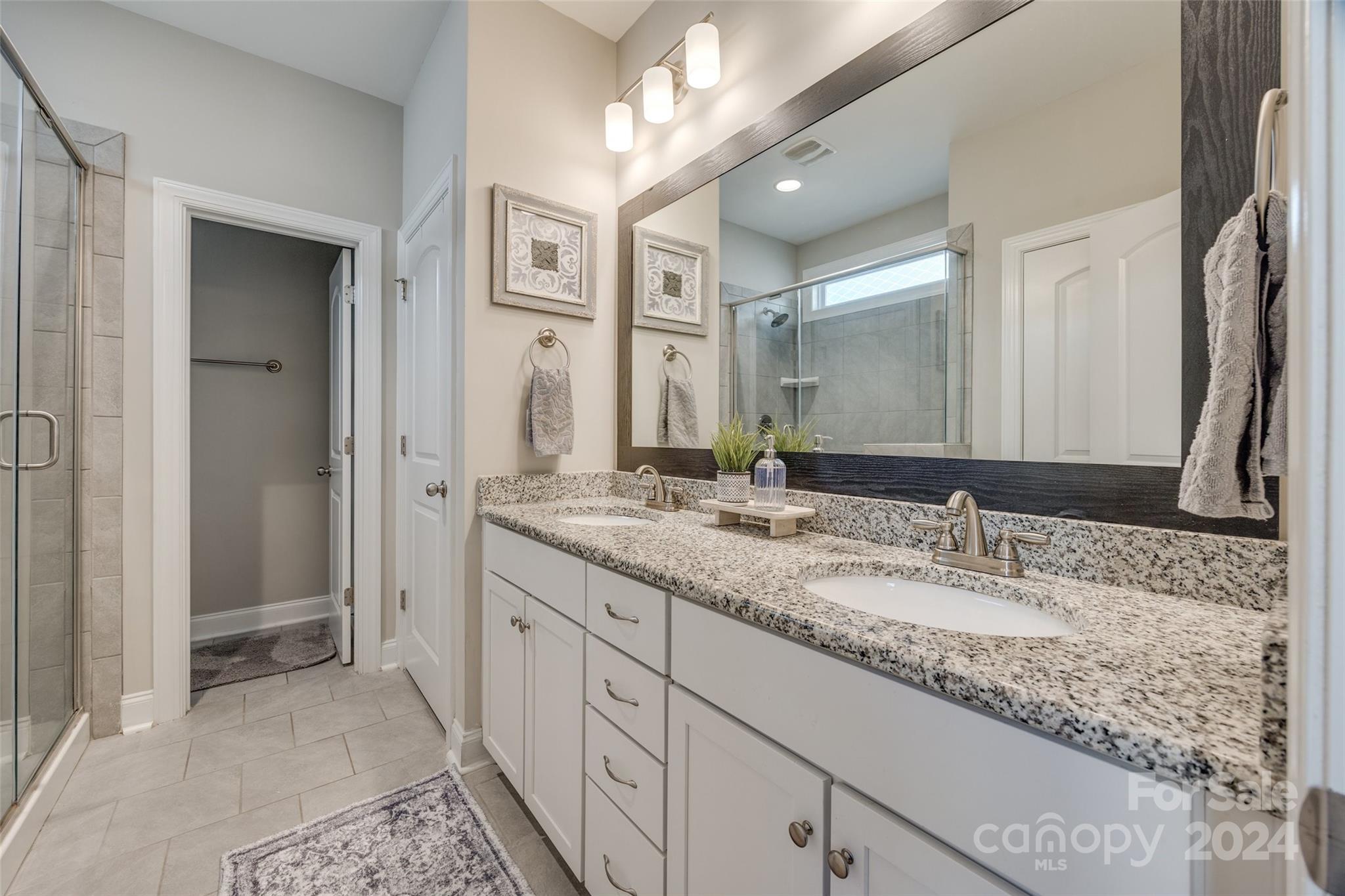 133 Pine Eagle Drive Rock Hill, SC 29732 - Photo 10 of 25 a bathroom with a granite countertop double vanity sink and a mirror