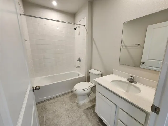 a bathroom with a sink and a vanity
