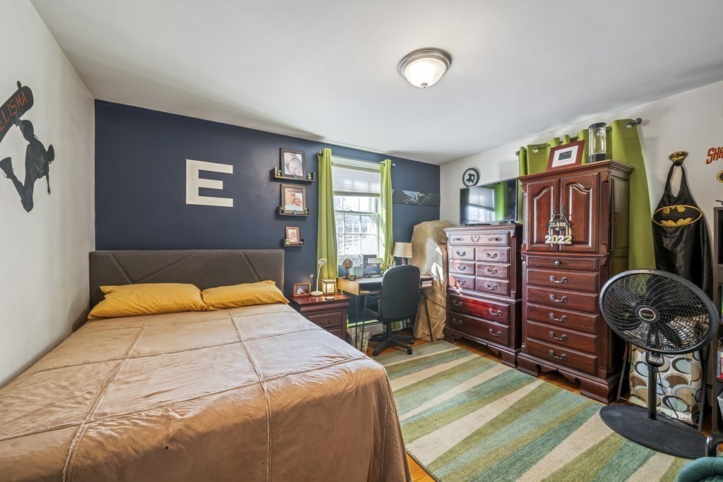 8 Robert Plunkett Circle Randolph, MA 02368 - Photo 12 of 22 a bedroom with a bed and dresser