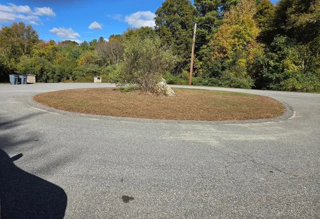 a view of a backyard of a house