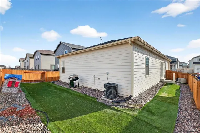 an aerial view of a building with outdoor space