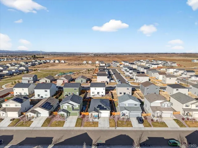 an aerial view of a building with outdoor space