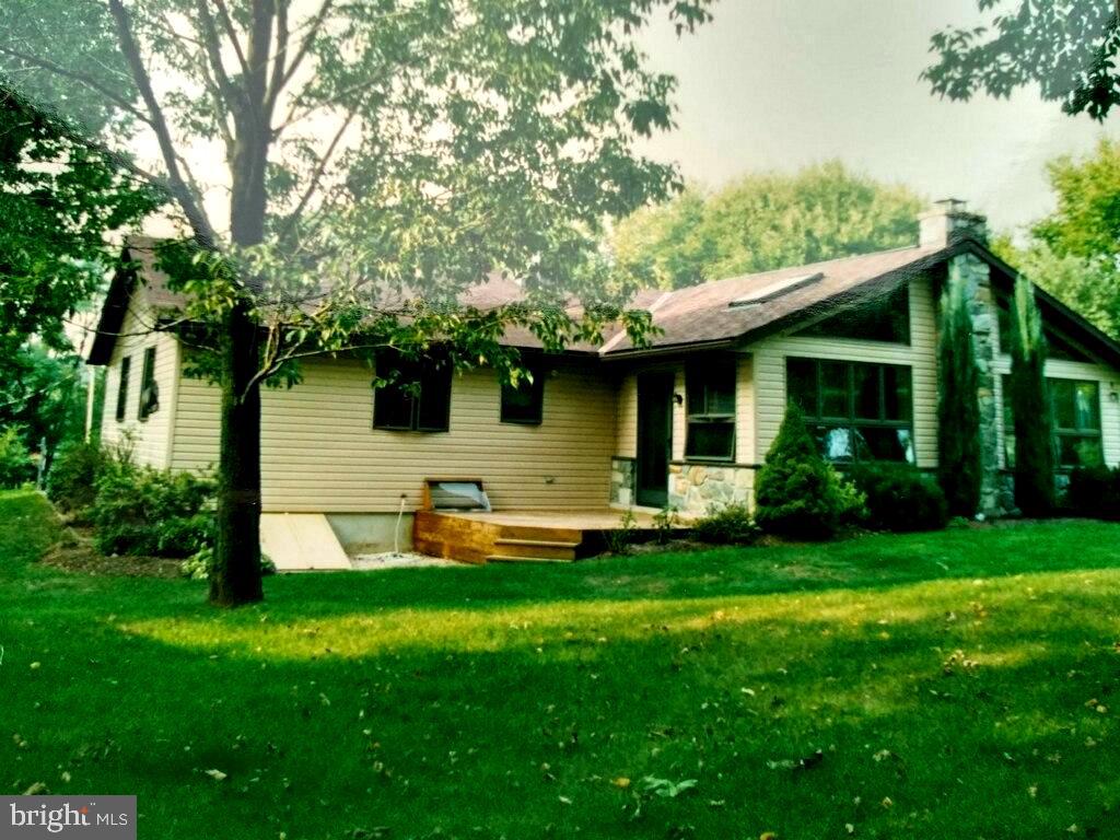 2086 Needhammer Road Pottstown, PA 19464 - Photo 12 of 58 rear of home summer