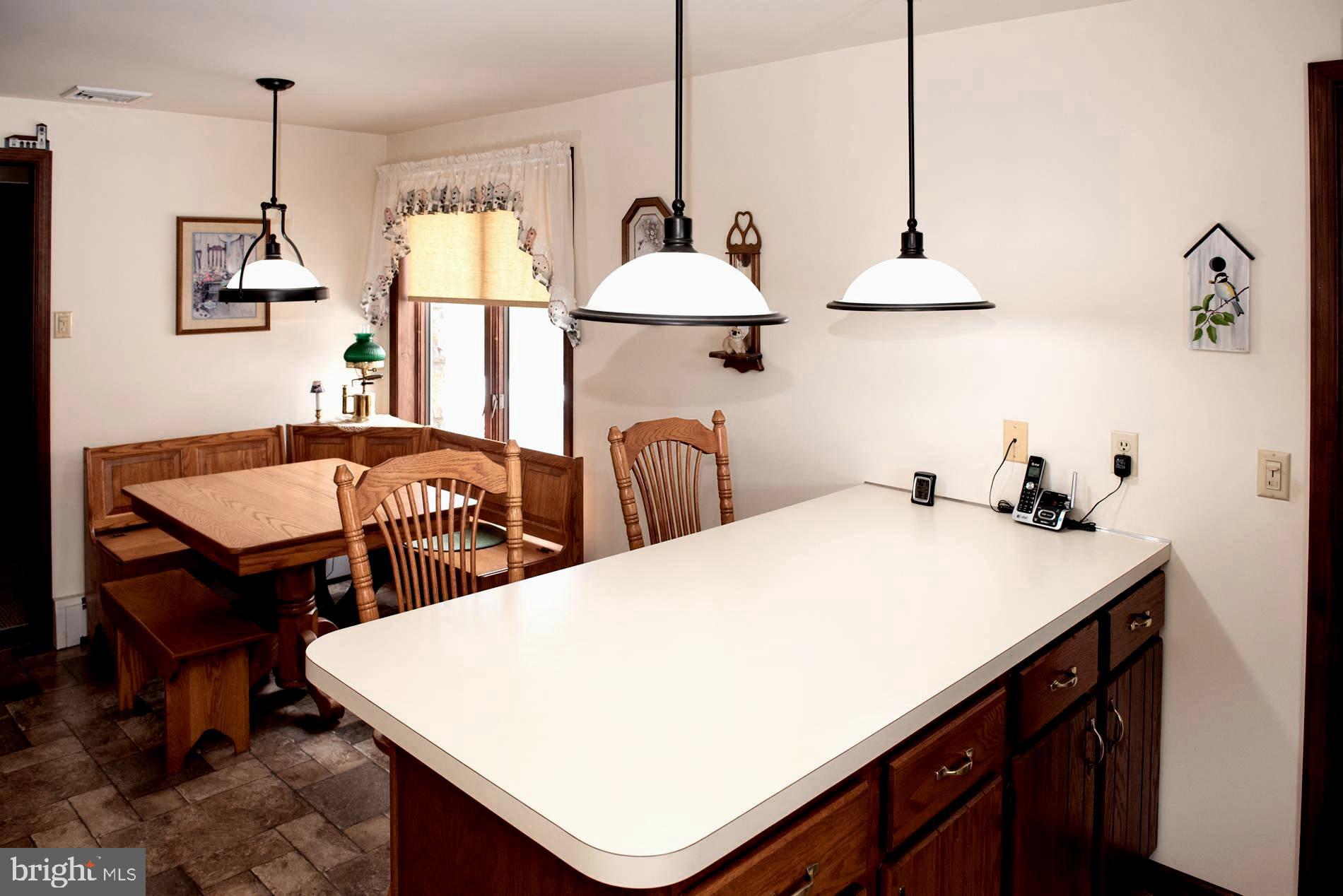2086 Needhammer Road Pottstown, PA 19464 - Photo 15 of 58 eat in kitchen with countertop and table seating