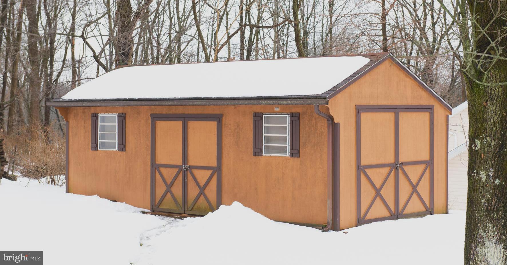 2086 Needhammer Road Pottstown, PA 19464 - Photo 49 of 58 a shed car storage and workshop with electric
