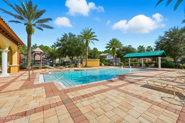 a view of a house with a swimming pool