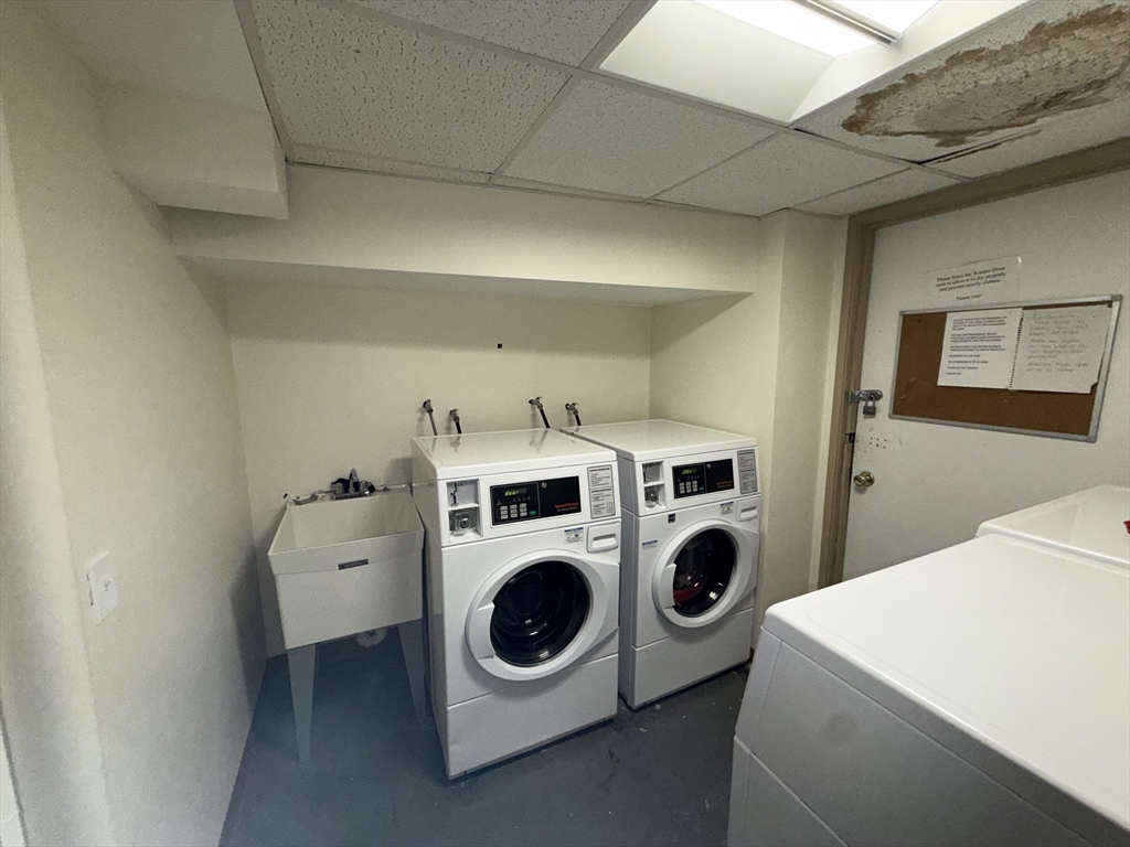 176 Maple Avenue, Unit 131 Rutland, MA 01543 - Photo 11 of 16 a utility room with dryer and washer