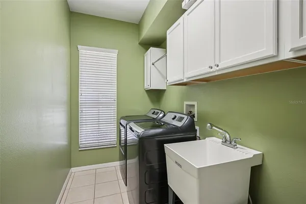 a utility room with washer and dryer