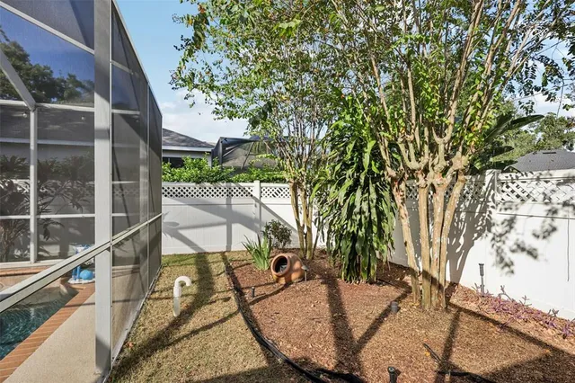 a view of a balcony with two chairs
