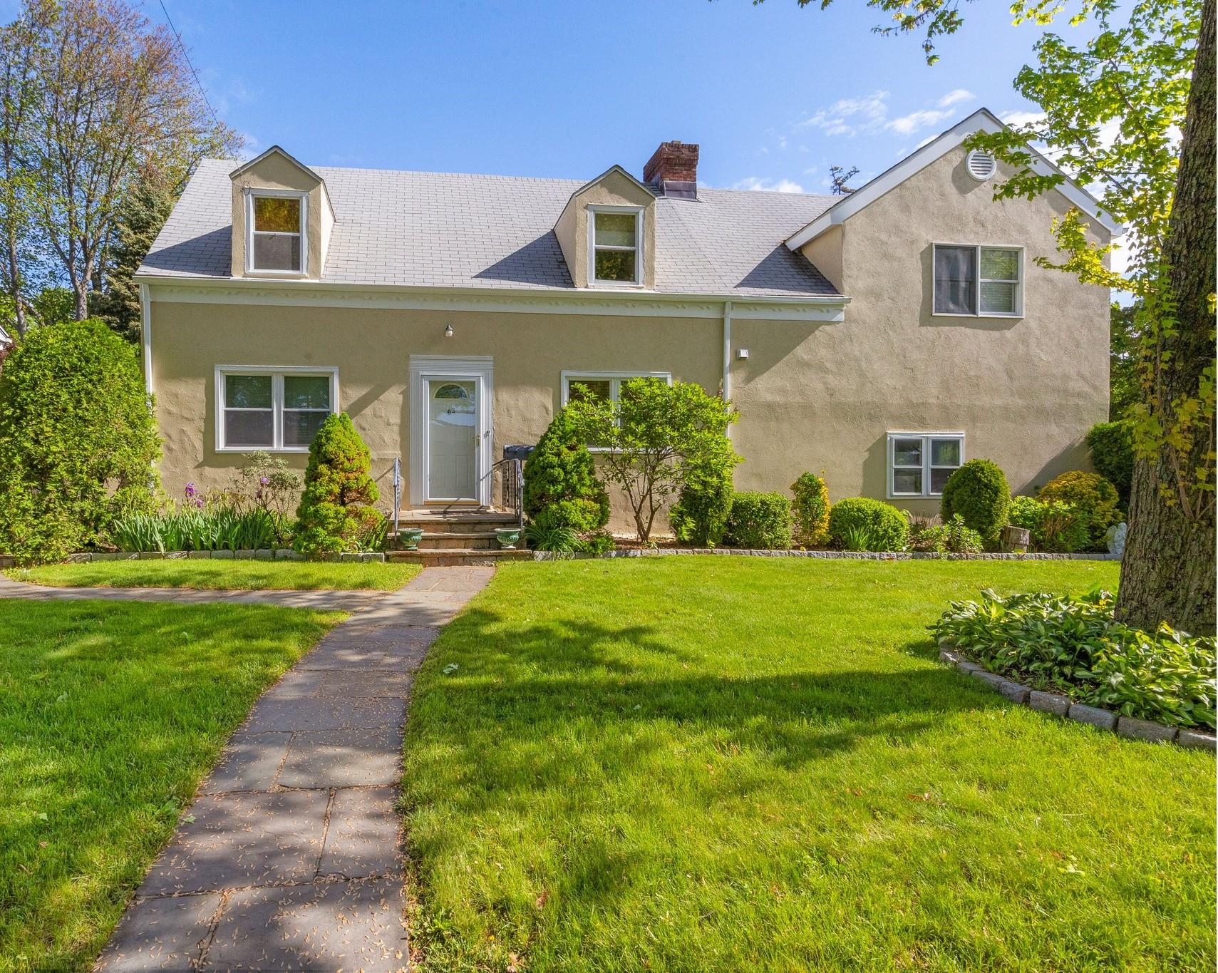 63 Mill Road Eastchester, NY 10709 - Photo 1 of 1 View of front of home featuring stucco siding
