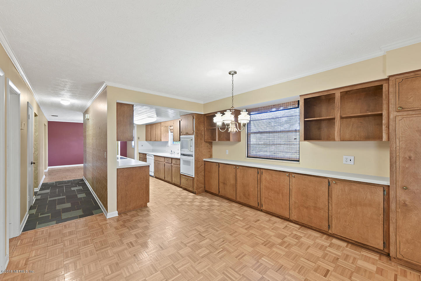 6511 Ferber Road Jacksonville, FL 32277 - Photo 13 of 27 a view of a kitchen with a sink and cabinets