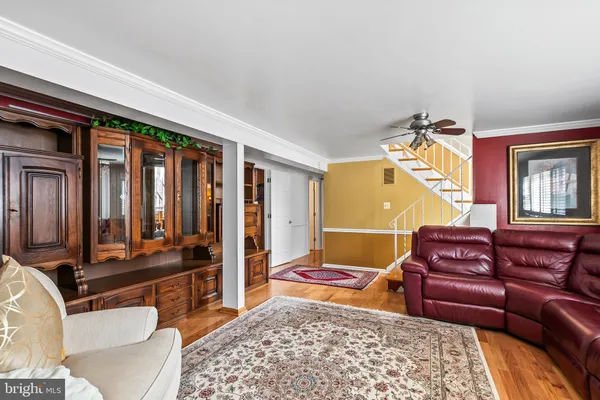 a kitchen with stainless steel appliances granite countertop a refrigerator and microwave