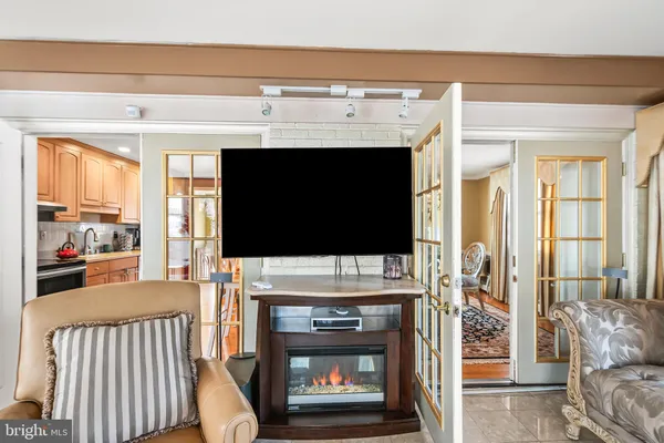 a view of room with window and hardwood floor