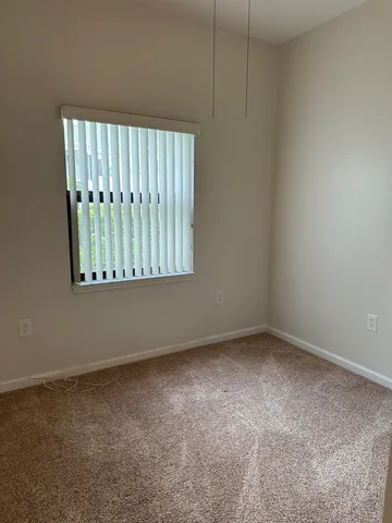 a front view of a house with a garage