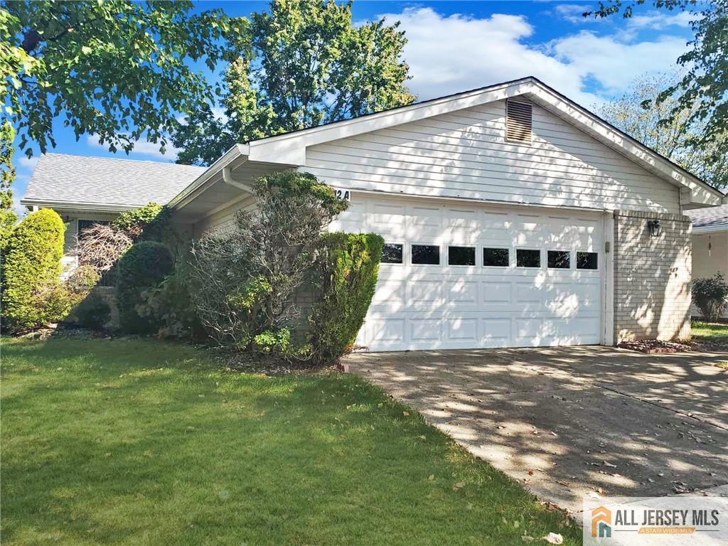 742A Pompton Road, Unit A Monroe Township, NJ 08831 - Photo 2 of 23 a front view of a house with a yard