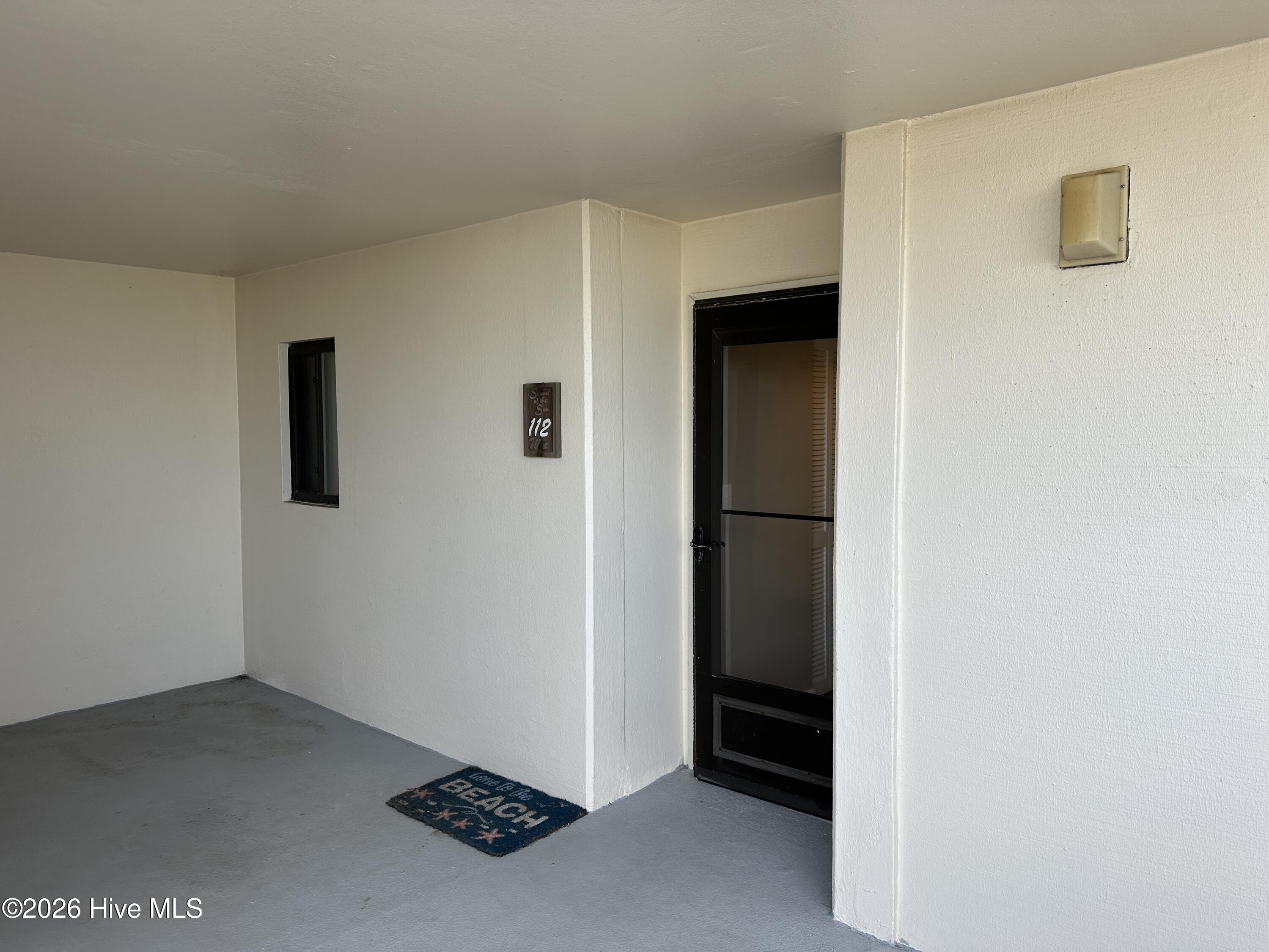 8801 Reed Drive, Unit 112 Emerald Isle, NC 28594 - Photo 2 of 30 Main Entry #112