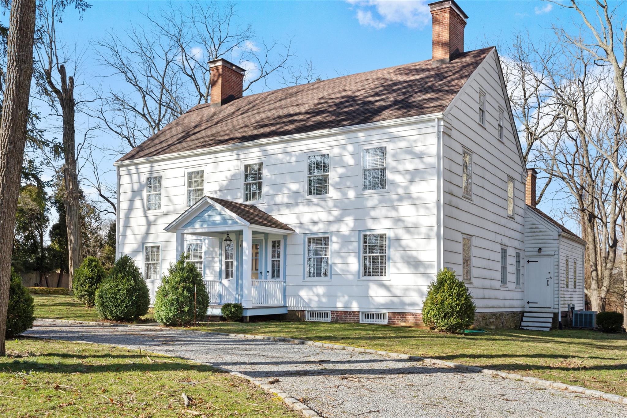 208 North Country Road Miller Place, NY 11764 - Photo 1 of 1 Colonial house with a front yard and cooling unit