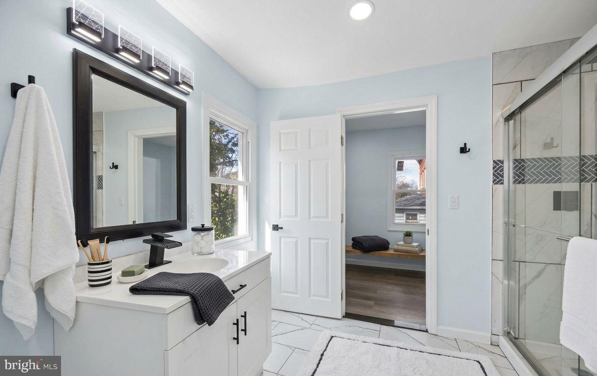6 West Griffith Street Penns Grove, NJ 08069 - Photo 20 of 25 a bathroom with a sink a toilet and a mirror