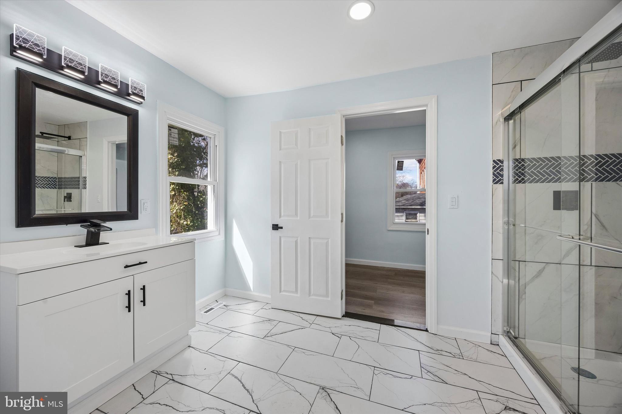 6 West Griffith Street Penns Grove, NJ 08069 - Photo 21 of 25 a bathroom with a sink and a mirror