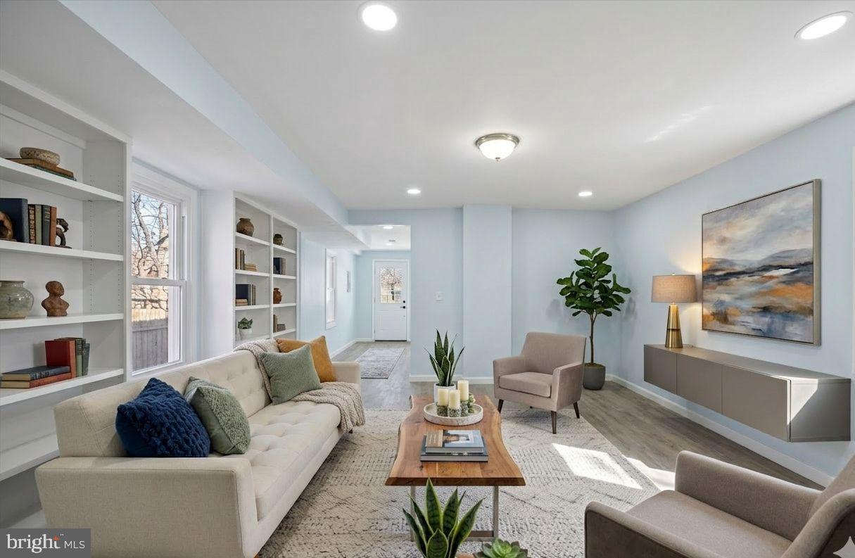 6 West Griffith Street Penns Grove, NJ 08069 - Photo 5 of 25 a living room with furniture and a potted plant