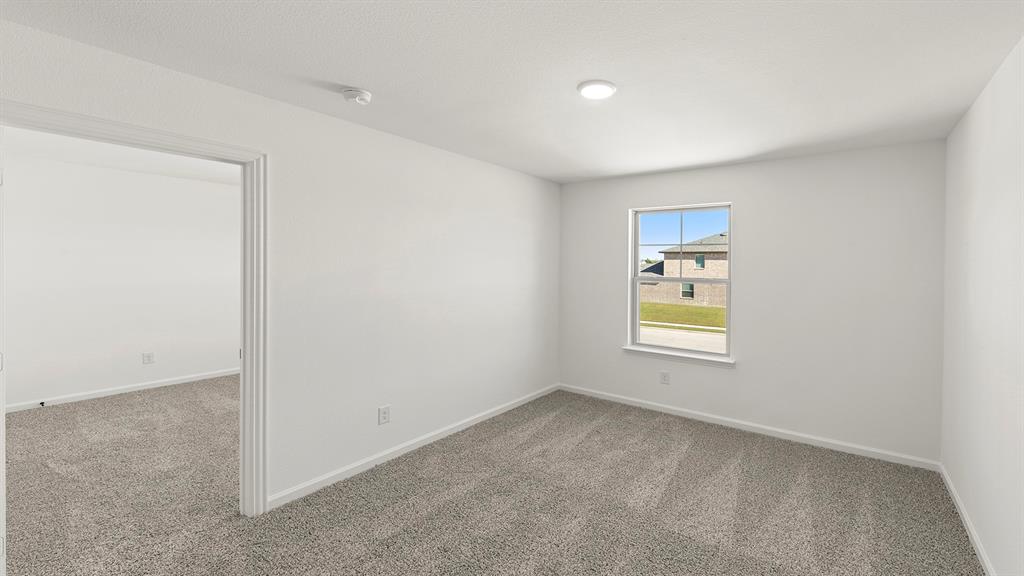 2524 YO Rnch Road Anna, TX 75409 - Photo 12 of 30 a view of an empty room with a window