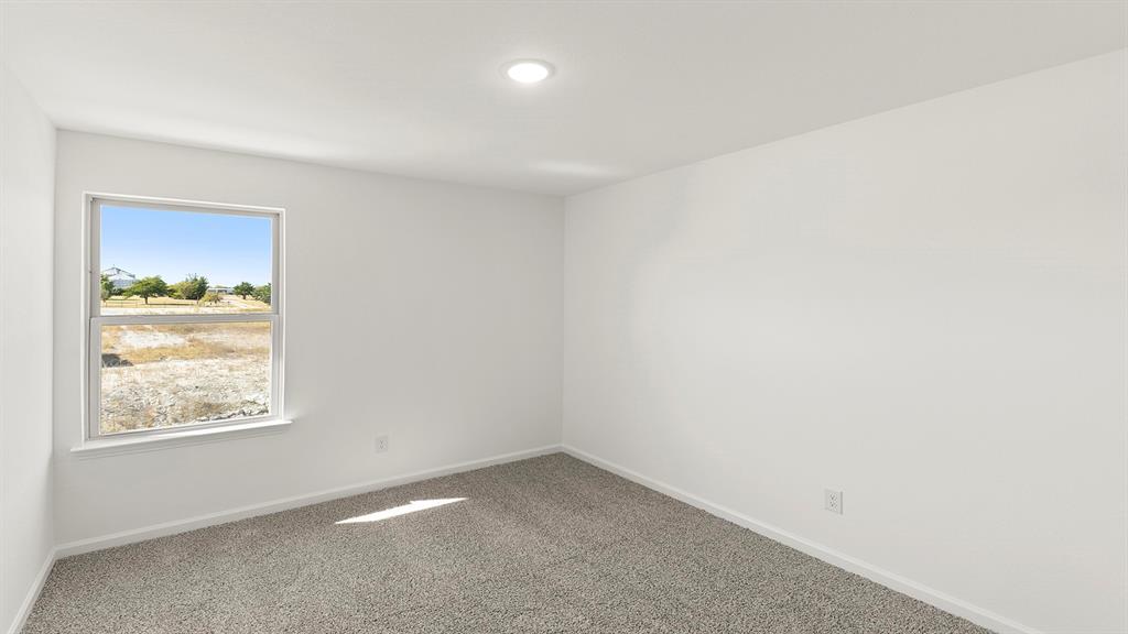 2524 YO Rnch Road Anna, TX 75409 - Photo 13 of 30 an empty room with windows